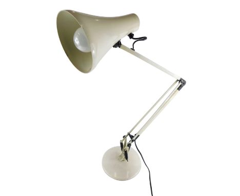 A metal framed Anglepoise lamp, on circular foot with cone shade, indistinct label, 67cm high. 