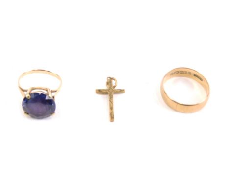 A 9ct gold wedding band, size N, a cross marked .375 3.5g all in and an unmarked dress ring set with amethyst coloured stone.