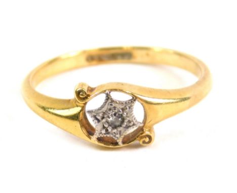 A 18ct gold dress ring, with central star set with small diamonds, on a shaped shank, ring size L-M, 3g all in.