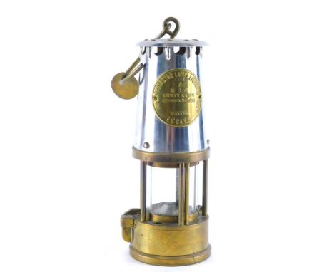 An Eccles Six miner's lamp, in brass and chrome plated case, with S scroll handle, 27cm high.