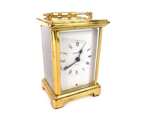 A 20thC French brass carriage clock, with swing handle and bracket feet, 5cm back plate with Roman numeric dial, J W Benson r