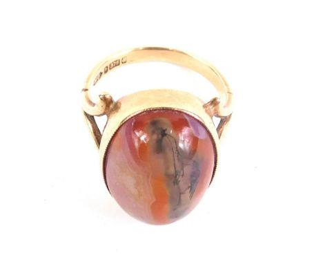 A 9ct gold dress ring, set with oval red agate stone, size N, 6.1g all in.