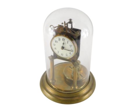 A 20thC anniversary clock, the 8cm diameter dial with Arabic numerals, surmounted by a pierced finial, on cylindrical support