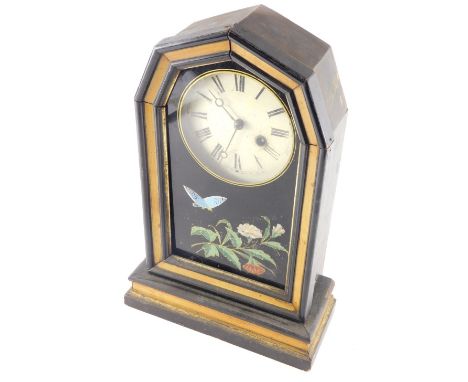 A 19thC mantel clock, with glazed front, ebonised hexagonal case, 11cm diameter dial with Roman numeric stencilling and keywi