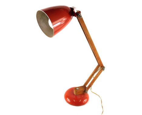 A vintage Anglepoise lamp, with wooden stem, metal orange cone shade and circular foot, 45cm high. WARNING! This lot contains