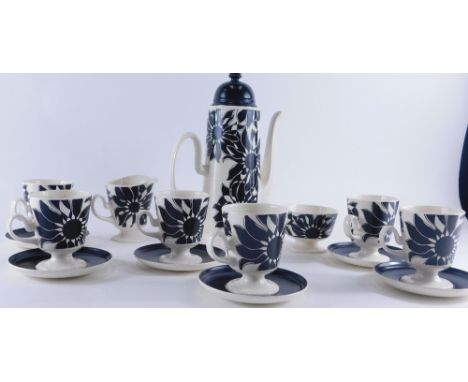 A Carltonware Oslo pattern coffee service, comprising coffee pot 34cm high, milk jug, sugar bowl, six cups and saucers, print