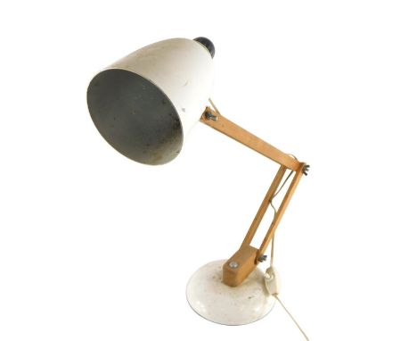 A vintage Anglepoise lamp, with wooden stem and white metal cone shaped shade, on circular foot, 51cm high. WARNING! This lot