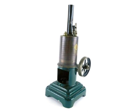 A mid 20thC Mamod style stationary engine, with fixed cylinder on stepped base, partially decorated in green, 30cm high.
