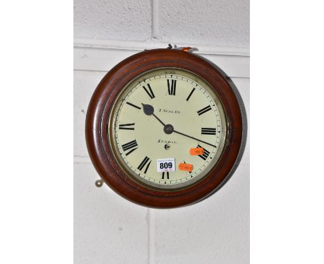 A CIRCULAR THOMAS SCALES OF KENDALL WALL MOUNTED DROP CLOCK with an enamelled clock face marked 'T Scales Kendal' with Roman 