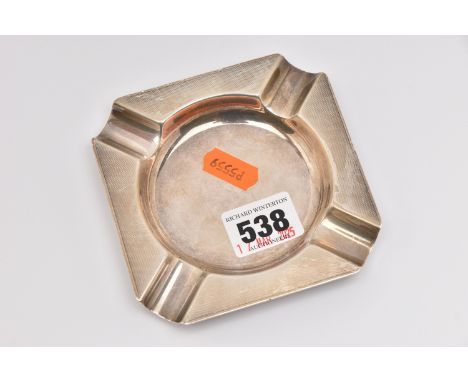 A SILVER ASH TRAY, a square form ashtray with engine turned pattern detail, hallmarked 'Henry Pidduck &amp; Sons' Birmingham 