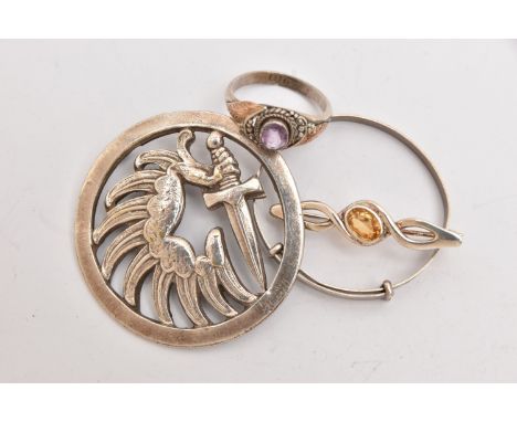 A SMALL SELECTION OF JEWELLERY, to include a child's white metal bangle, stamped Ster Silver, a white metal amethyst ring, st