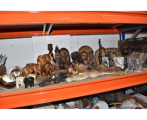 A GROUP OF DECORATIVE AFRICAN SCULPTURES, comprising a selection of masks, animal sculptures, figures, instrument etc. carved