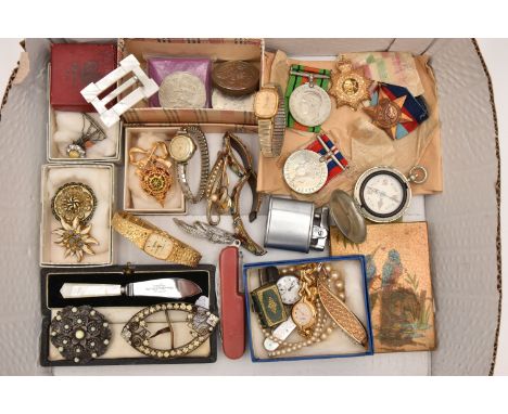 A BOX OF ASSORTED ITEMS, to include a shrapnel fragment with a rose metal cartouche and bail, engraved 's Africa 1900', a str