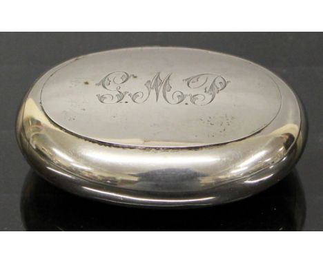 A silver snuff box of oval form with gold wash interior (Chester 1908).