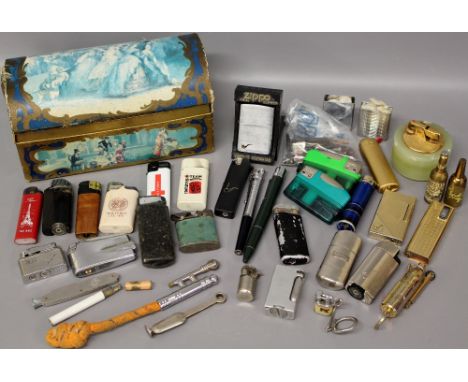 A variety of  cigarette lighters and lighter pens including  Zippo and Calibrui