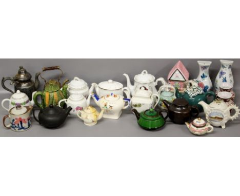 A collection of European teapots (ceramic and metal) & a pair of small Greek vases