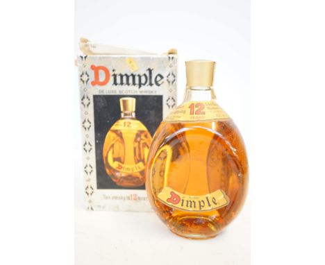 Dimple scotch whisky unopened with box 