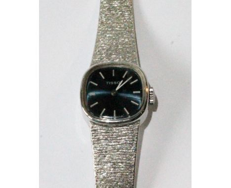 Lady's Tissot 9ct white gold bracelet watch with textured decoration, 1975.