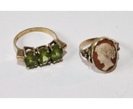 Ring with three peridots in 9ct gold and another cameo.   (2)