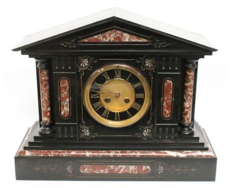 Victorian black slate and red marble architectural mantel clock, the cylinder movement striking on a gong, 36cm high.