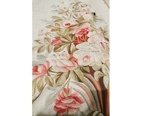 Pair of Napoleon III Aubusson tapestry portieres, c. 1860, both woven with a central vertical palm leaf stem with rose bouque