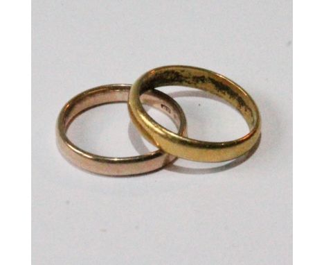 18ct gold band ring and another, 9ct.  (2)