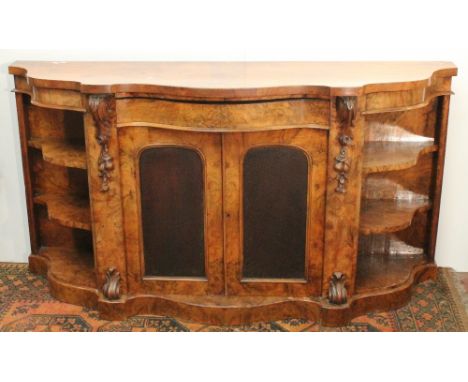 Victorian serpentine walnut credenza with two arched panel doors flanked by open shelves, on plinth base, 92cm high and 175cm