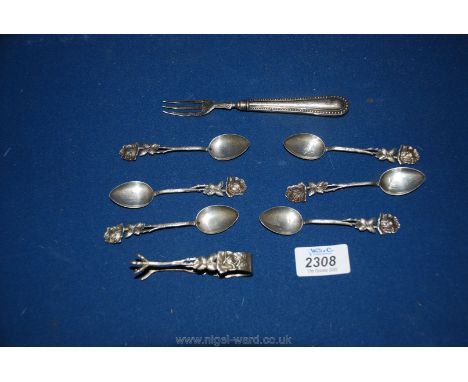 A set of continental silver teaspoons with flower handle, sugar tongs and fork, plus a silver pickle fork, Birmingham 