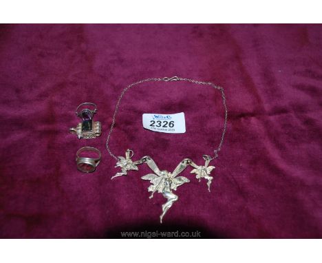 A vintage silver plated fairy necklace, silver rings, etc.