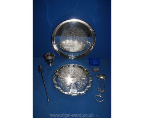 A silver plated vintage three pronged bread fork, silver plated candle snuffer, and a galleried tray plus another tray, etc.