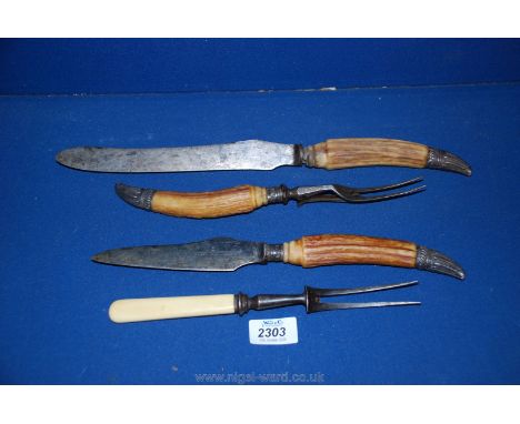 A horn handled Carving set with Sheffield silver ends, plus one other fork.