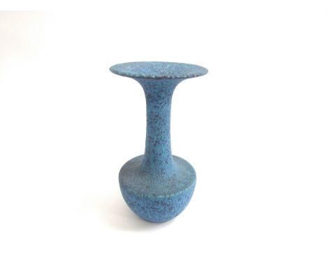 A studio ceramic flared vase with high fired volcanic blue glaze. Unmarked 25.3cm high