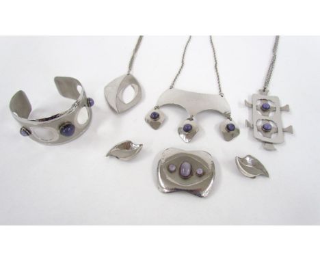 A collection of vintage retro Moda Jewellery made in Malta in stainless steel, including bangles, pendants , earrings etc, al