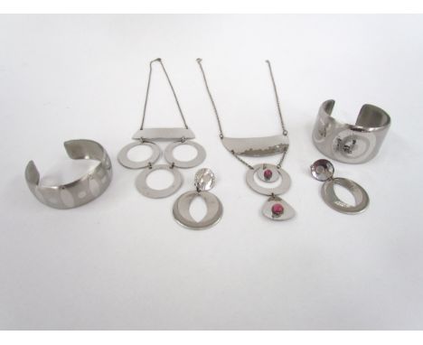 A collection of vintage retro Moda Jewellery made in Malta in stainless steel, including bangles, pendants , earrings etc, al