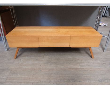 A retro Habitat low sideboard, light oak, three drawer front, on splayed legs. 120cm x  35.5cm x 40cm high 