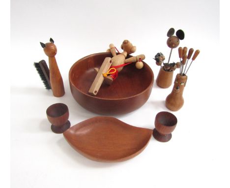 A collection of novelty vintage wooden items in the form of animals, possibly Danish, and a selection of vintage teak bowls a