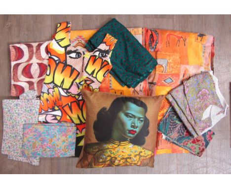 A collection of vintage textiles including an official Tretchicoff Green lady cushion, Edinburgh Weavers length of fabric , a