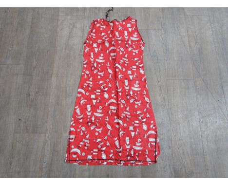 A custom made dress from vintage 1950's fabric in the manner of Eduardo Paolozzi. 