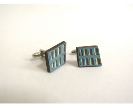 A pair of Dan Stafford ceramic cufflinks 