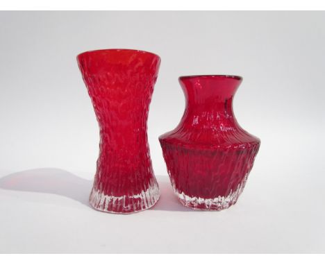 A Whitefriars 'Pot Belly' vase designed by Geoffrey Baxter in Ruby, No.9832, 13cm high and a 9836 vase in Ruby, 15cm high (2)