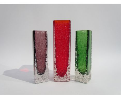 Three Whitefriars Nailhead vases designed by Geoffrey Baxter, No.9808 20cm in Ruby and 9683 17cm in Aubergine and Meadow Gree