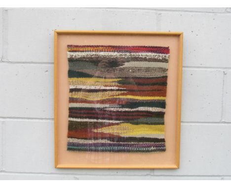 A framed woollen abstract tapestry initialled signature to bottom right. Overall size 55cm x 50cm&nbsp;&nbsp; 