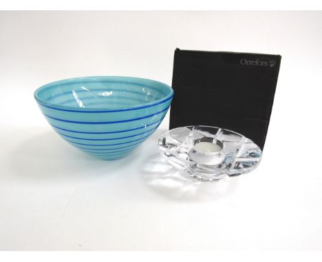An Orrefors Madison candle holder, 14.5cm diameter, boxed and a Kosta Boda Anna Ehrner bowl, No 59500, etched marks to base, 