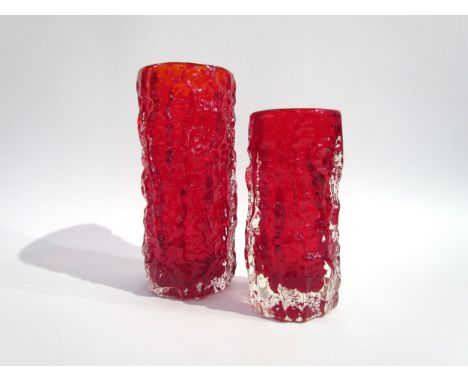 Two Whitefriars Bark textured cylindrical vases designed by Geoffrey Baxter in Ruby colourway. 19cm and 15.5cm 