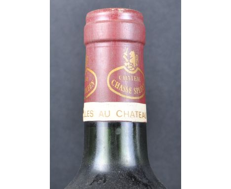 Bottle of vintage Chateau Chasse-Spleen 1982. Seal appears unopened.