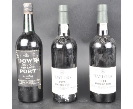 Three bottles of vintage port to include:&nbsp; Two bottles of Taylor's 1975 vintage port and Dow's vintage 1970 port. Alcoho