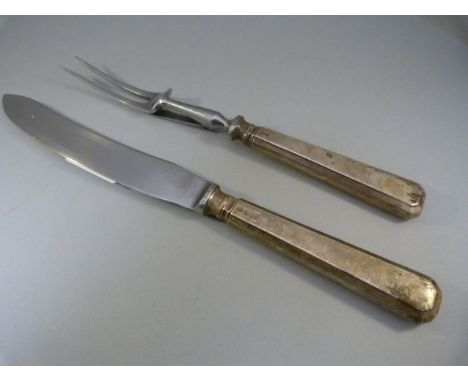 John Biggin (subsequently John Biggin Ltd) 1941 meat carver Knife and fork. Silver handles, stainless blades. Total weight 17