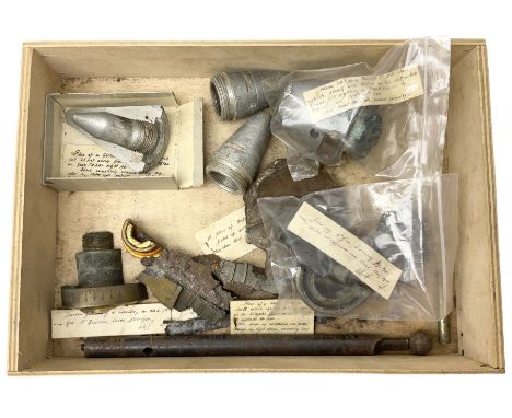 Small collection of WW2 shrapnel and German and British shell parts, most with manuscript details of where and when found inc