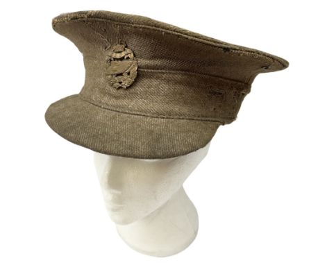 WW1 British Army stiff trench cap with Tank Corps cap badge
