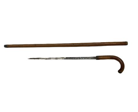 Late 19th/early 20th century sword stick/walking cane with 38cm fullered steel blade 85cm overall